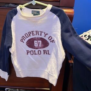 Polo by Ralph Lauren sweater. Football